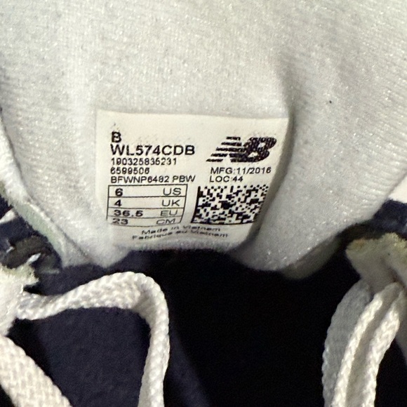 Women’s New Balance 574 Navy and Tan - Picture 2 of 8